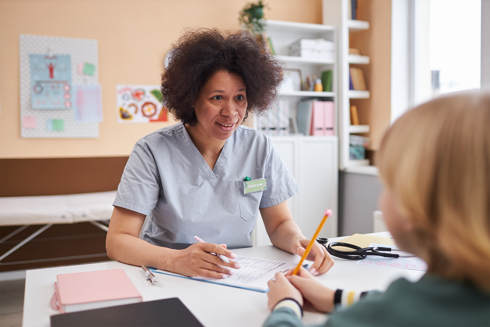 pediatrician talking to child